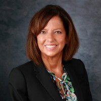 Smiling female wearing a suit jacket