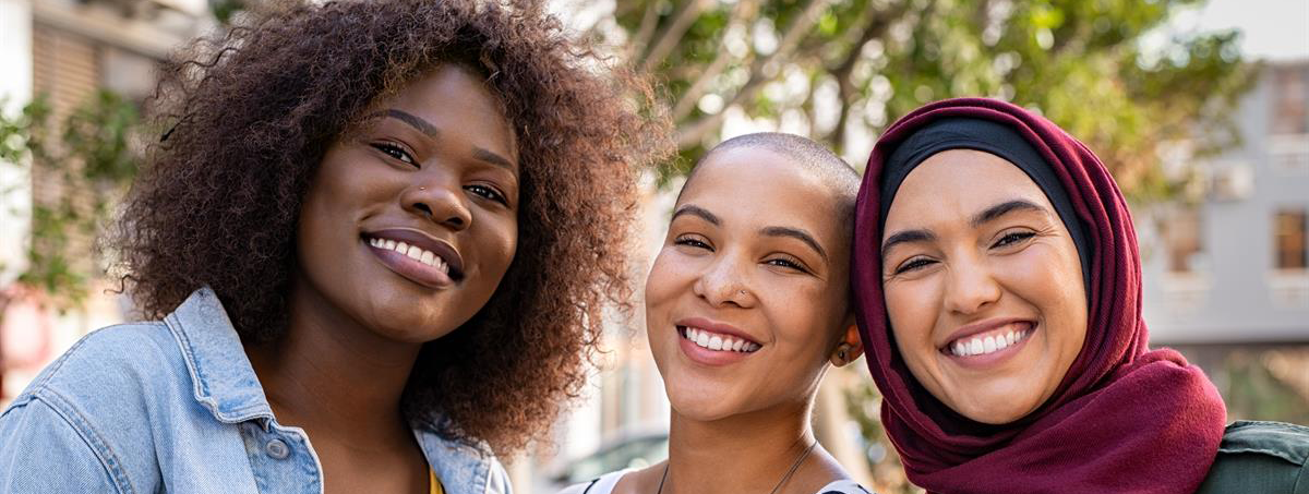 Group of students smiling at camera.