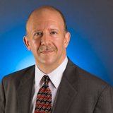 Headshot of Edward Trombley.