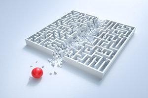 Illustration of a ball breaking through a maze demonstrating the concept of removing barriers.