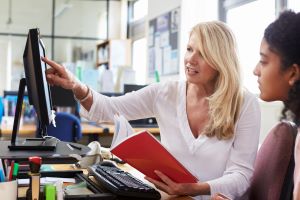 College advisor meeting female college student