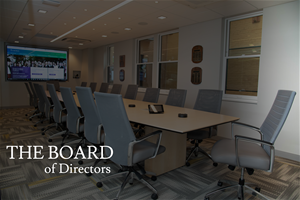 background of a conference room with the text "The Board of Directors" displayed in the bottom left corner