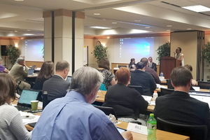 people listening at a conference