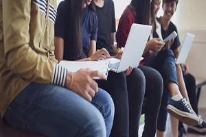 Group of students using laptops.