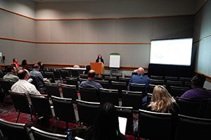 Group of professionals at an annual meeting session.