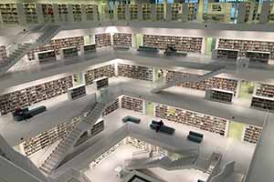 Large multi-level library with various seating areas.