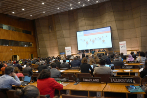 room appearing to be the United Nations general assembly hall