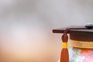 globe with a graduation cap on top