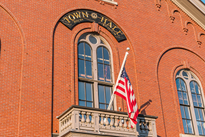 Photograph of a red brick town hall building.