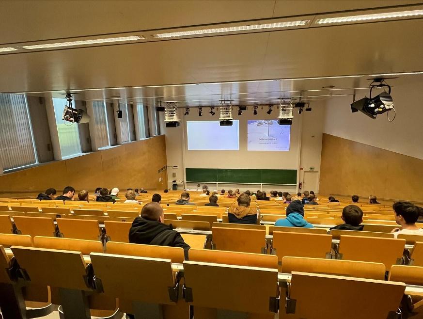 Group of students in a lecture hall, photograph taken during 2023 BW Seminar