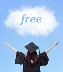 Student wearing their graduation cap and gown holding their arms open to the sky as they look at a cloud that says "free" on it.