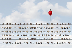 Illustration of power lines filled with birds and a single red balloon floating above the lines with a single bird on it.