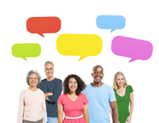 Diverse group of people smiling at the camera with colorful speech bubbles above their heads.