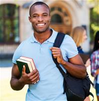 black male student with backpack and books