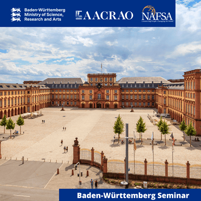 Courtyard of a large historic palace with banners for Baden-Württemberg Seminar, AACRAO, and NAFSA