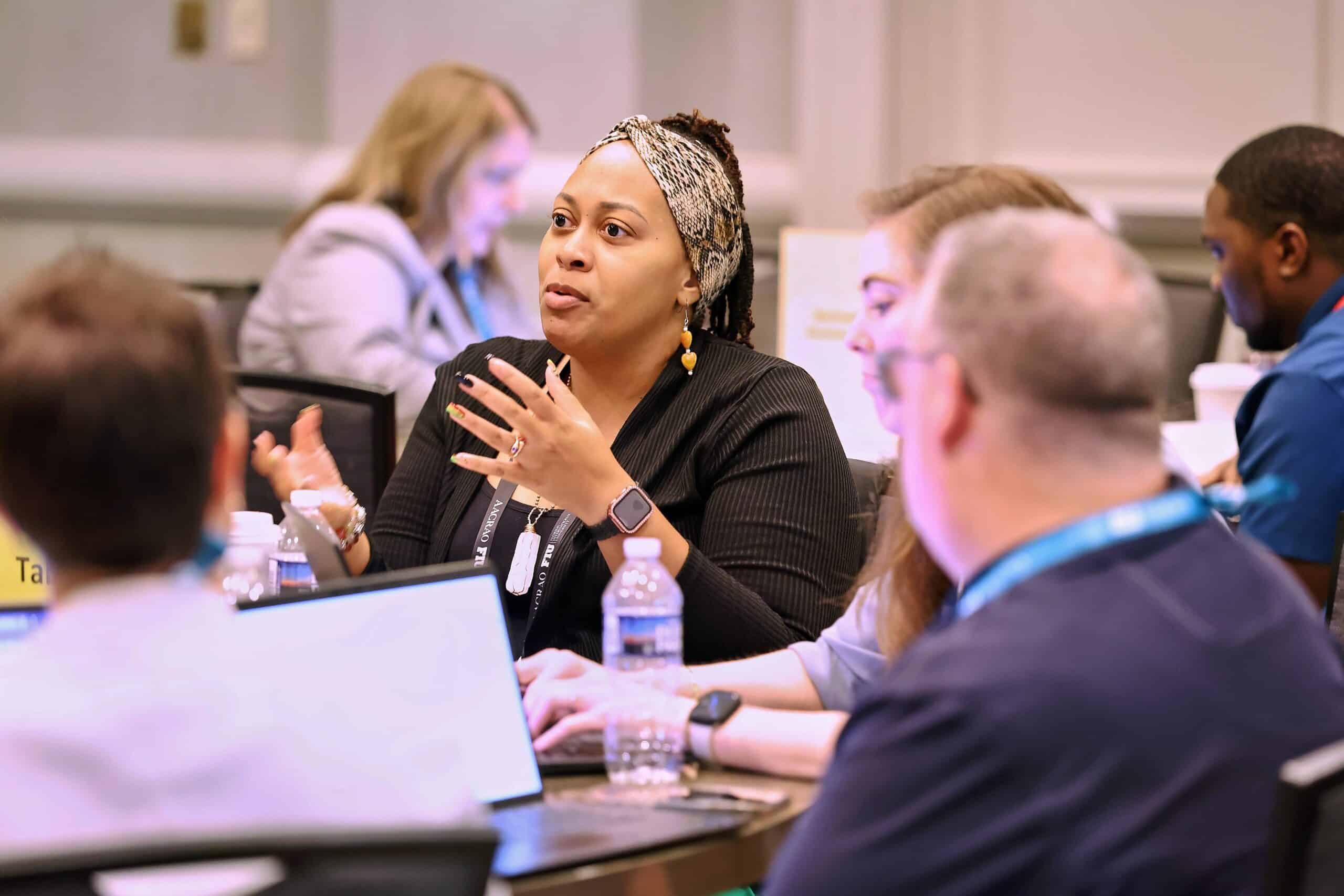 Woman speaking at Leadership Meeting
