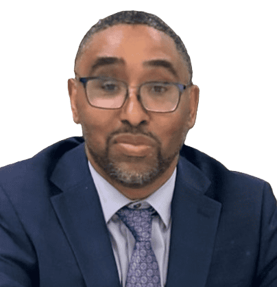 Portrait of a man in a suit and tie wearing glasses