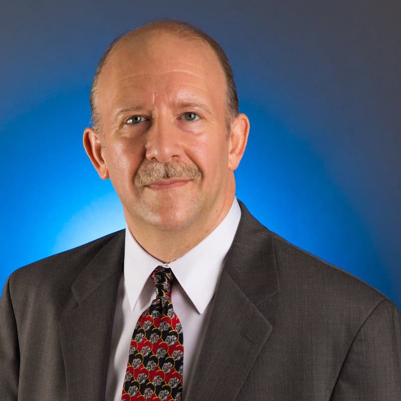 headshot of Edward Trombley