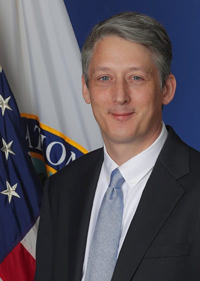 Headshot of James Kvaal