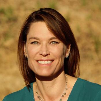 Headshot of Patricia De Vries.