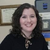 Portrait of a smiling woman in an office setting