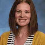 Headshot of April Cozine.