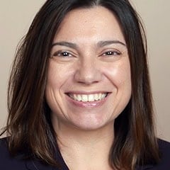 Portrait of a smiling woman with dark hair