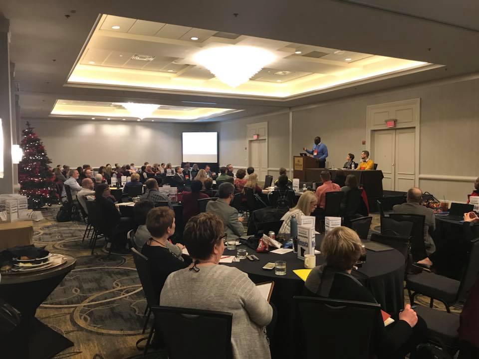 Photo from the audience's perspective of a breakout session at an AACRAO conference.