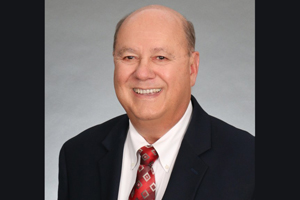 headshot of Wayne E. Becraft