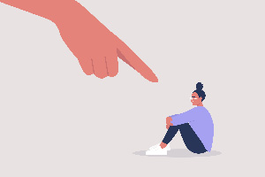 small cartoon female cries as a giant hand points at her