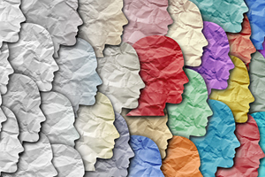 paper head silhouettes of various colors overlapping