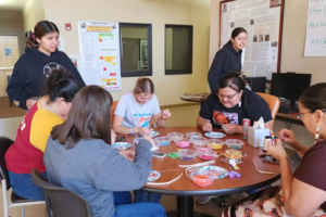 Bead work activity at Aaaniiih Nakoda College