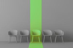 Five chairs with one chair highlighted in green