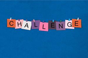 Post-its that spell the word Challenge