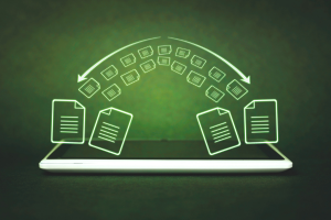 A tablet with icons of documents forming an arc above
