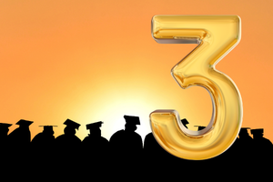 Line of graduates along the sunset sky with the number 3