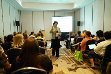 Photo of an event or session being held in a small space.