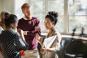 Group of professionals collaborating on an idea.