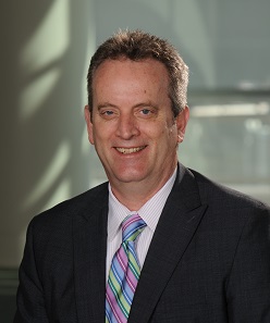 Headshot of Michael V. Reilly.