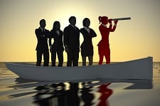 Group of grey silhouettes of business people on a canoe with a red female silhouette looking through a telescope at the front of the boat.