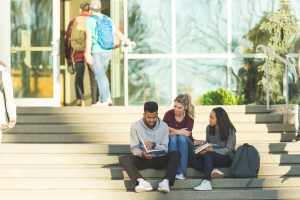 Students sitting on a staircase.