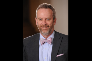 headshot of Mike Reilly
