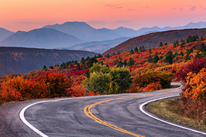 Photograph of a highway in Colorado during Autumn.