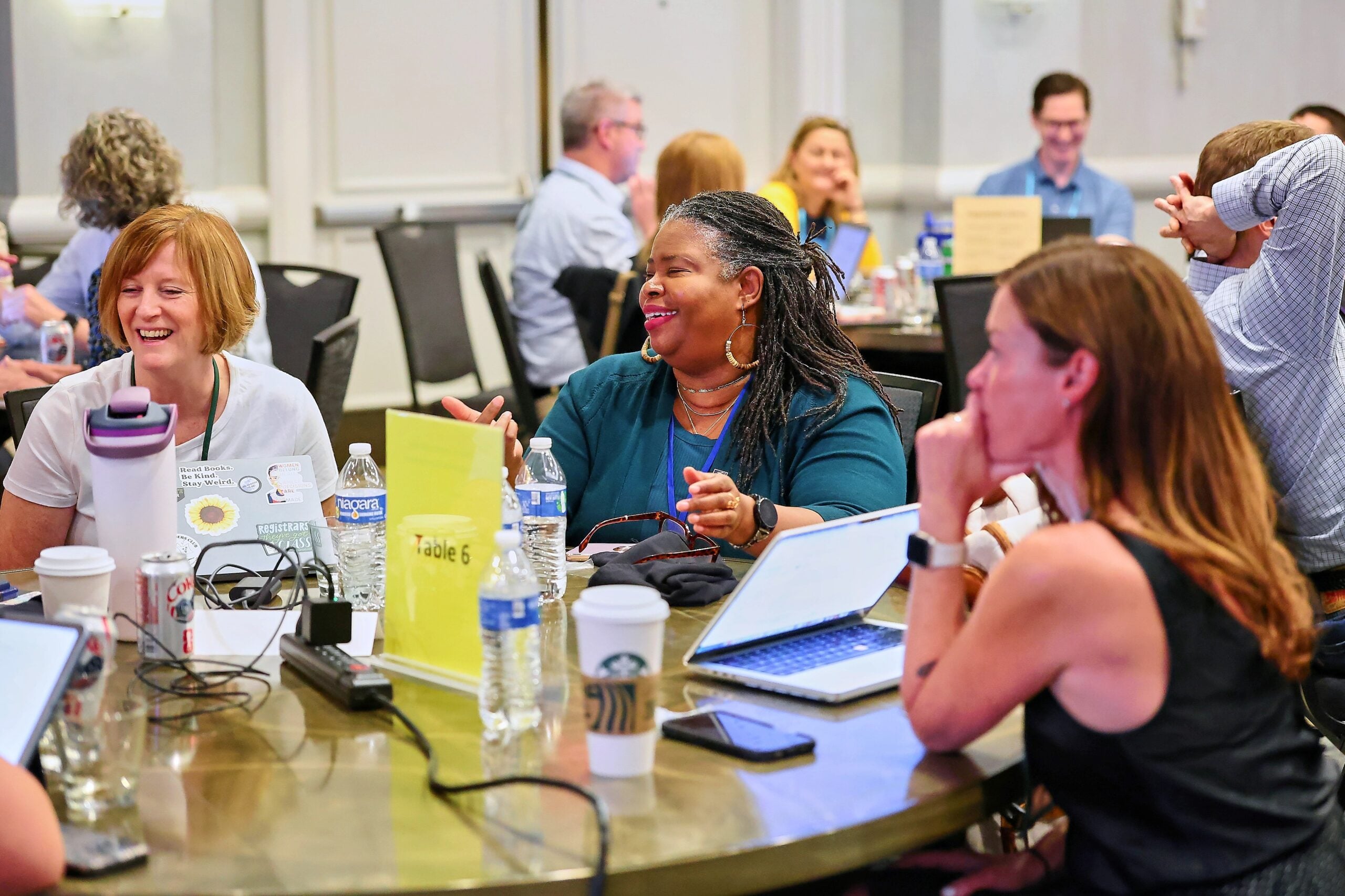 AACRAO members sit at a table at the 2026 Leadership Meeting