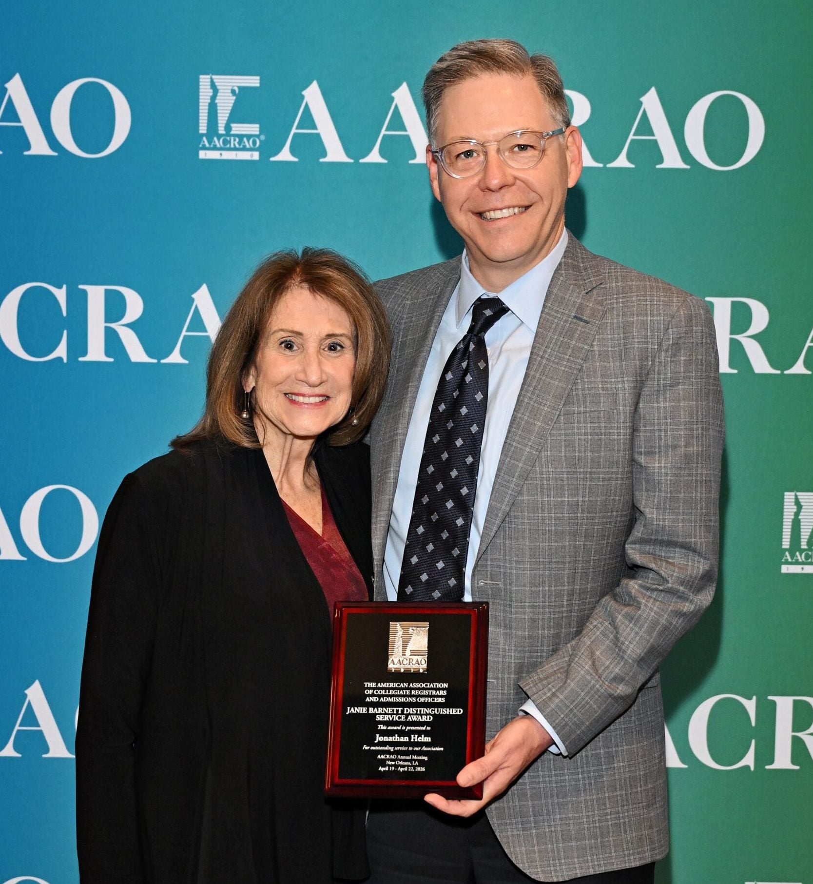 Jonathan Helm receives the Janie Barnett Distinguished Service Award alongside Janie Barnett